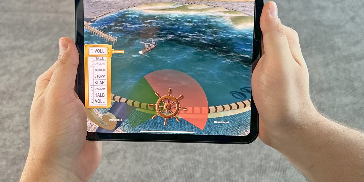 Ein Mann mit Tablet nutzt die AR-Funktion der neuen App